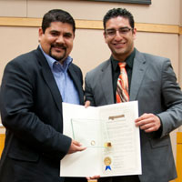Oscar Chavez receiving his Jefferson Award from Supervisor Carrillo